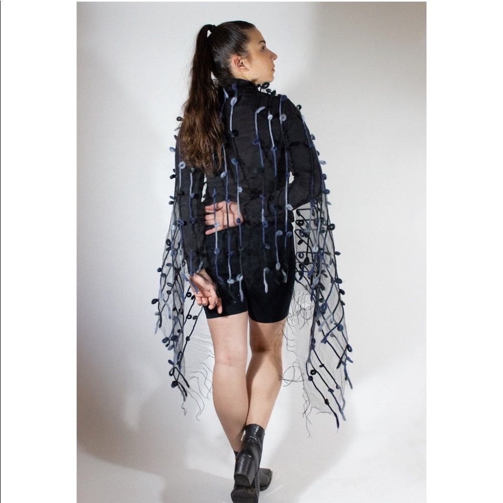 Mesh shall with decorative wool stripes